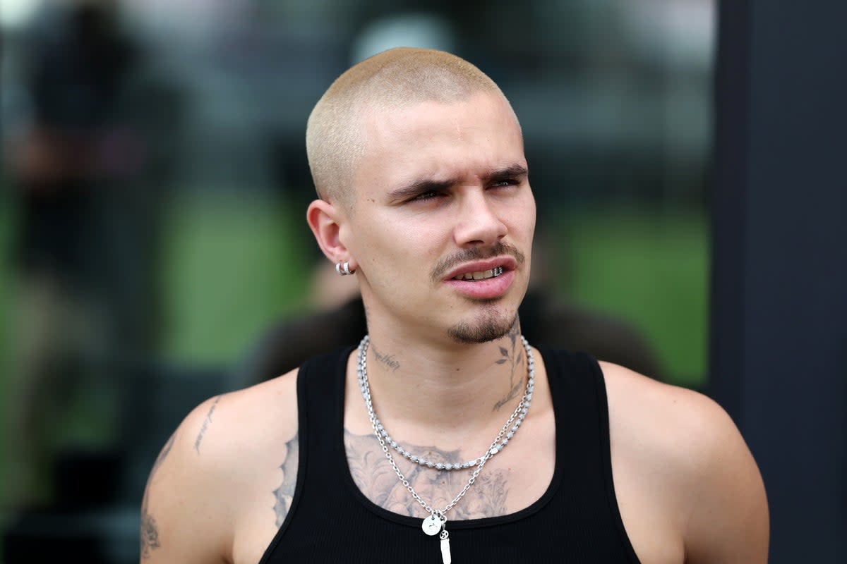 Romeo Beckham revealed at the weekend that he’s had a tattoo saying ‘family’ across the back of his neck (Getty)