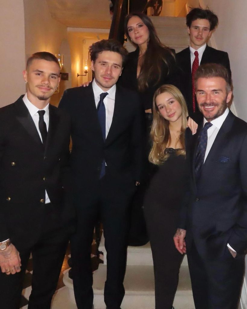beckham children standing on stairs 