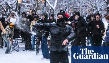 New York police decry snowballs pelted at officers as north-east US digs out of blizzard | US weather