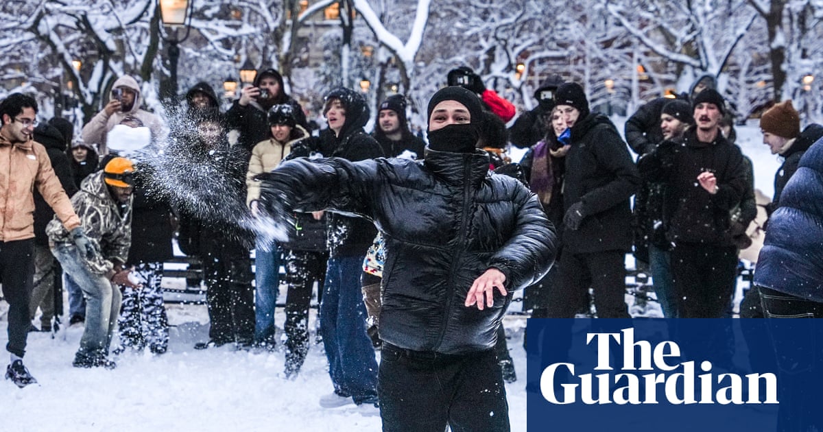 New York police decry snowballs pelted at officers as north-east US digs out of blizzard | US weather