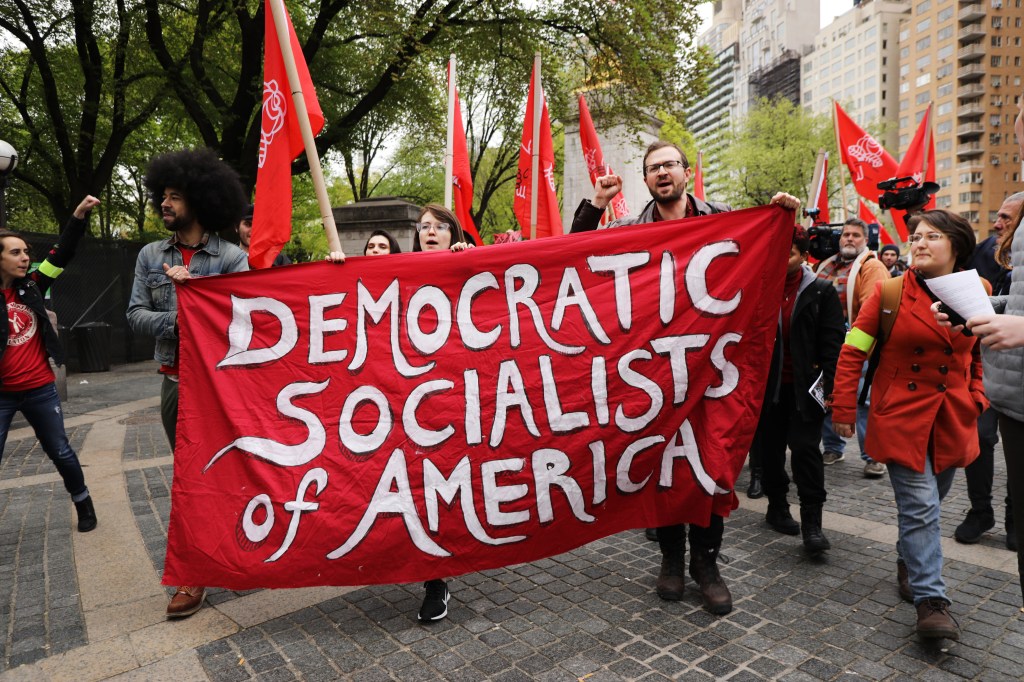Members of the Democratic Socialists of America gather outside
