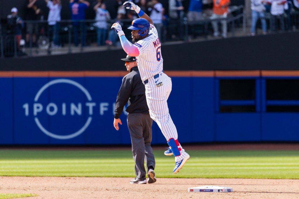 New York Mets outfielder Starling Marte (6) reacts after he hits a walk off RBI single to win the game in the bottom of the 10th inning against the Philadelphia Phillies. 