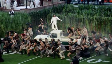 bad bunny on top of a white truck