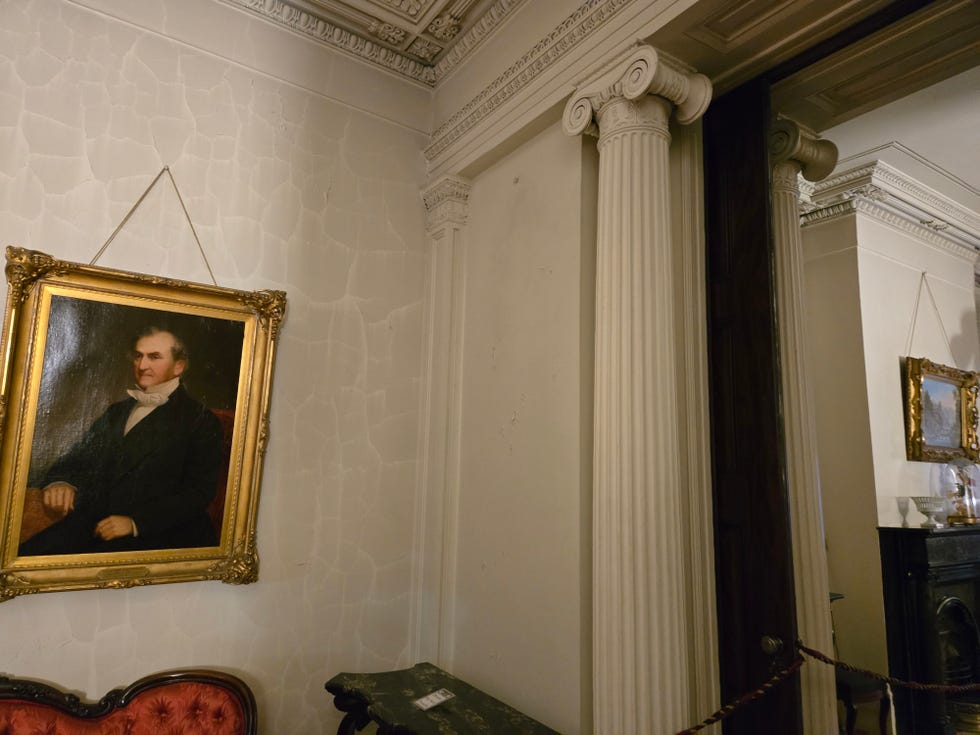 interior view of a room featuring classical architecture and artwork