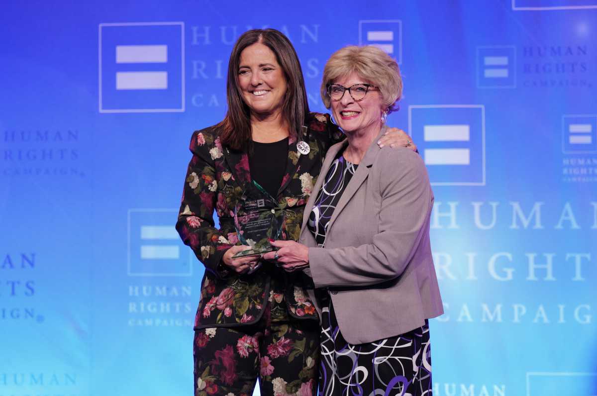 (L-R) Dolores Covrigaru presents the Community Impact Award to Juli Grey-Owens onstage during the Human Rights Campaign 2026 Greater New York Dinner at Marriott Marquis Times Square on February 07, 2026 in New York City.  (Photo by Craig Barritt/Getty Images for Human Rights Campaign)
