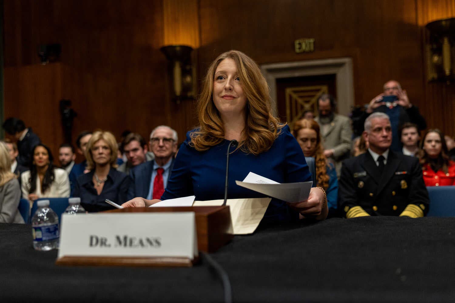Dr. Casey Means sitting in a congressional hearing room.