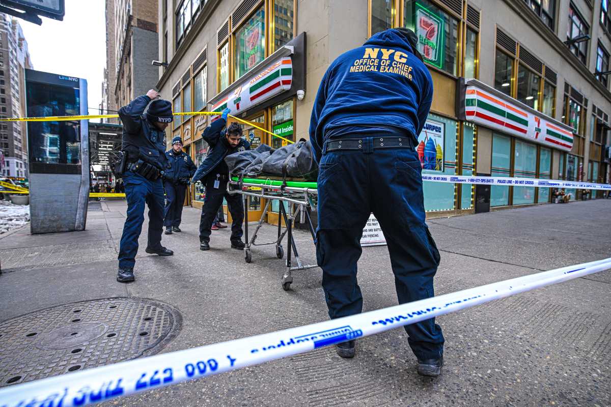police wheel out body of man shot at Midtown 7-eleven store