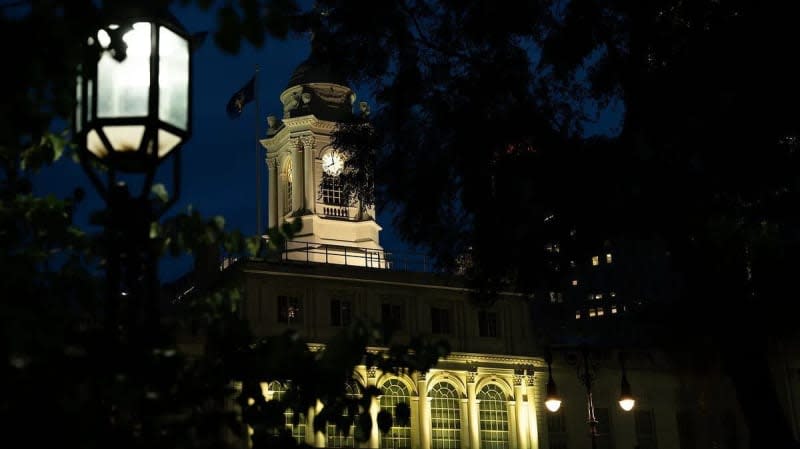 New York City Hall lit in yellow on Aug. 23, 2023. Photo: Caroline Rubinstein-Willis / © City of New York via Flickr / 2023 / Used with Permission