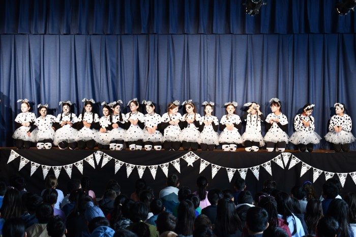Learners play dalmatians in the Center Street School production.