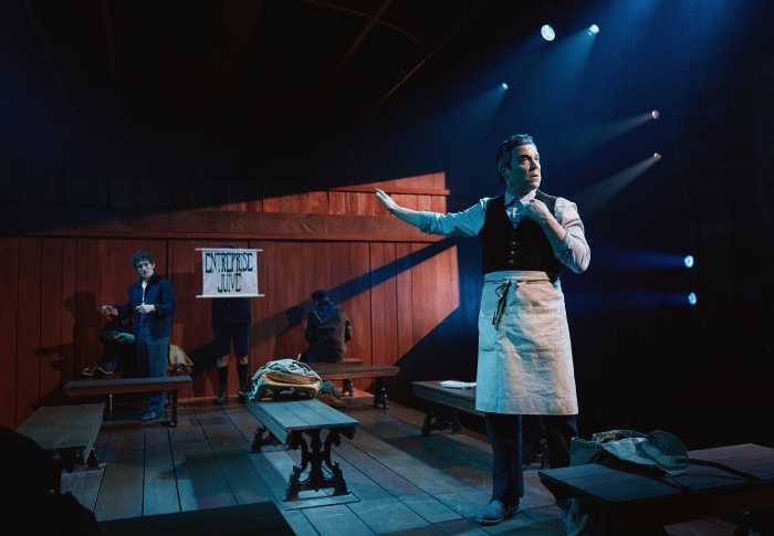 actors performing on a wooden stage