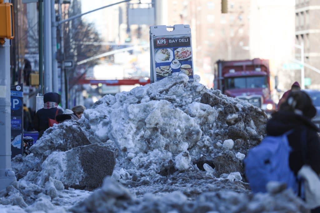 Kips Bay Deli at 545 Second Ave in Manhattan, NY, put a deli sign on top of a tall snow pile on January 30, 2026. James Messerschmidt for the NY Post