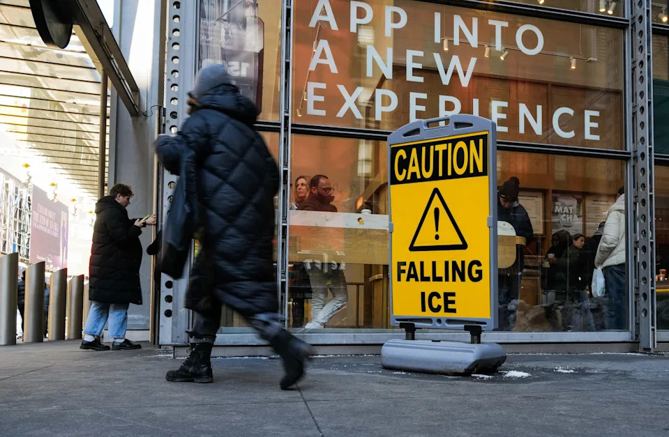 NEW YORK, NEW YORK - FEBRUARY 04: A sign for falling ice warns pedestrians on February 04, 2026 in New York City.