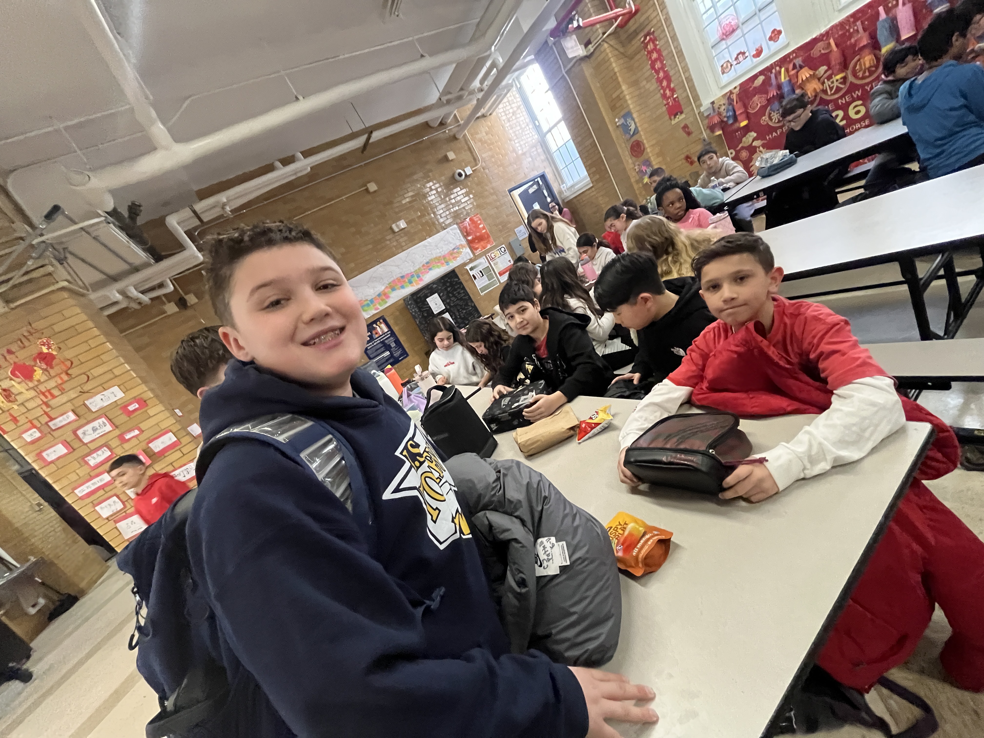 CJ Patella and Jonathan Kolbaska enjoy lunchtime. Millions of schools across the United States, including some on Staten Island, like I.S. 34 in Tottenville, took part in National No One Eats Alone Day. The lunchtime program, created by the nonprofit Beyond Differences, aims to make cafeterias more welcoming by encouraging students to connect with classmates they might not usually sit with. Today's lunch also featured dancing. (Advance/SILive.com | Jan Somma-Hammel)