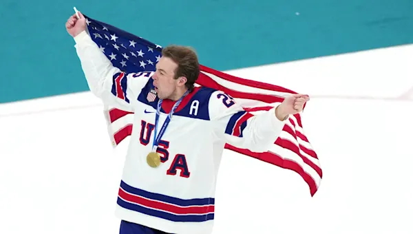 News 12 | Brooklyn | ‘I’m still on that cloud.’ Mom of LI Olympian beams with pride after son’s gold medal win