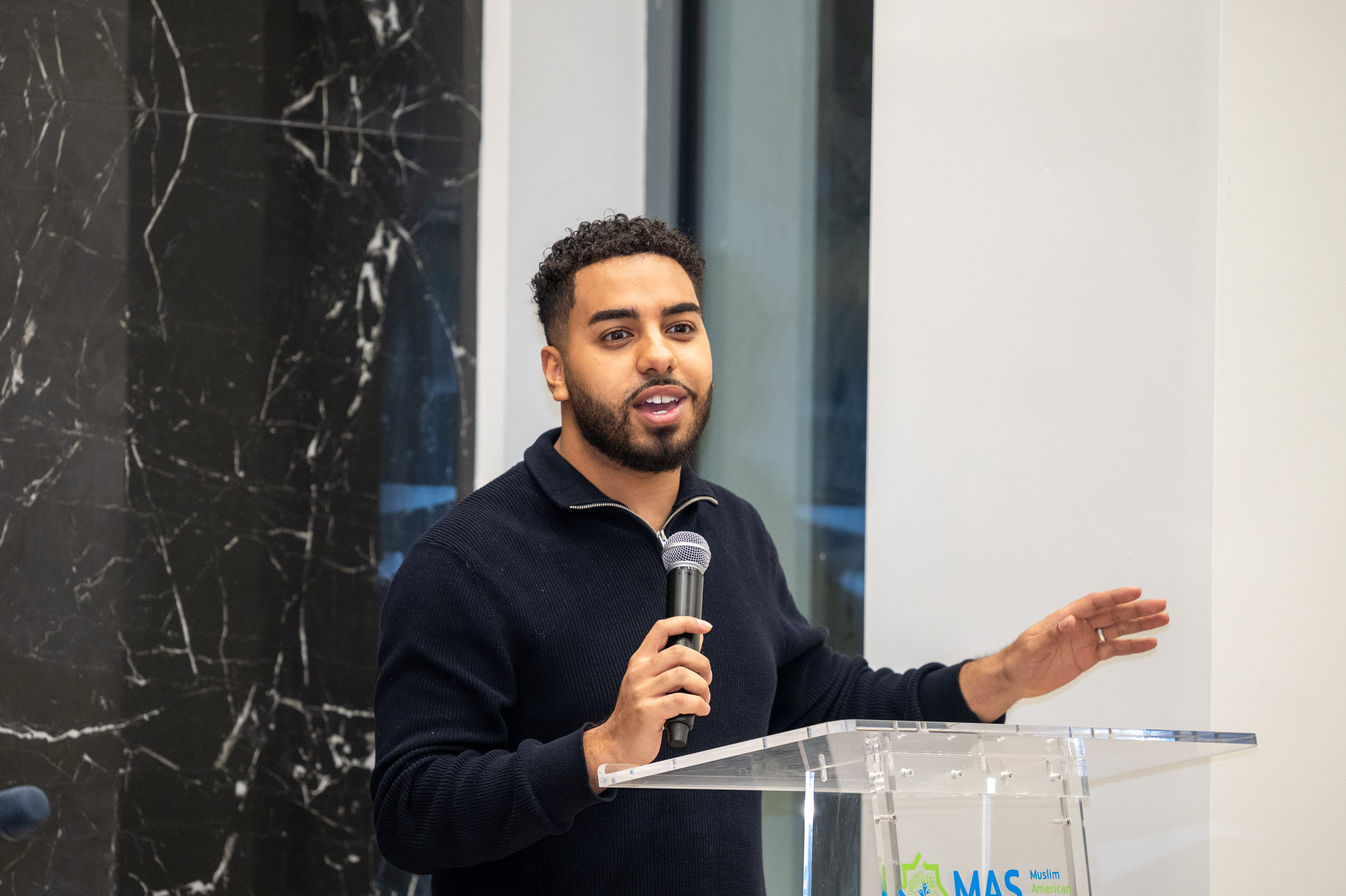 Abdullah Akl speaks to members of the Muslim American Society of Staten Island, who gathered to celebrate Ramadan in their newly expanded community center in Dongan Hills on Tuesday, February 17, 2026. (Owen Reiter for the Advance/SILive.com)