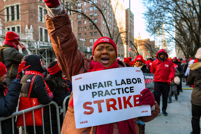 Striking nurses at 2 NYC hospital systems approve new contract but ones at another reject deal
