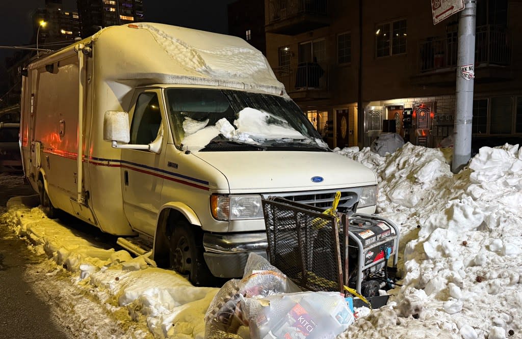 The scene of where a veterinarian died in Queens after snow clogged the exhaust of his mobile clinic on Sunday. David Burns/@FD4D
