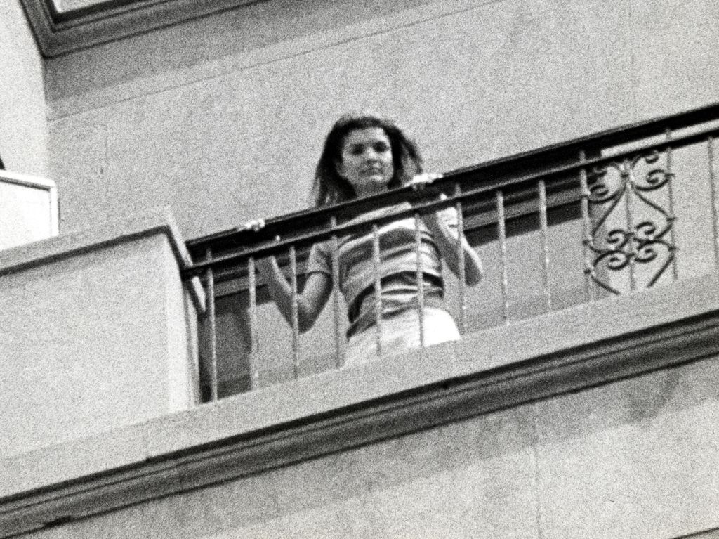 photo of jackie kennedy standing on terrace at nyc apartment