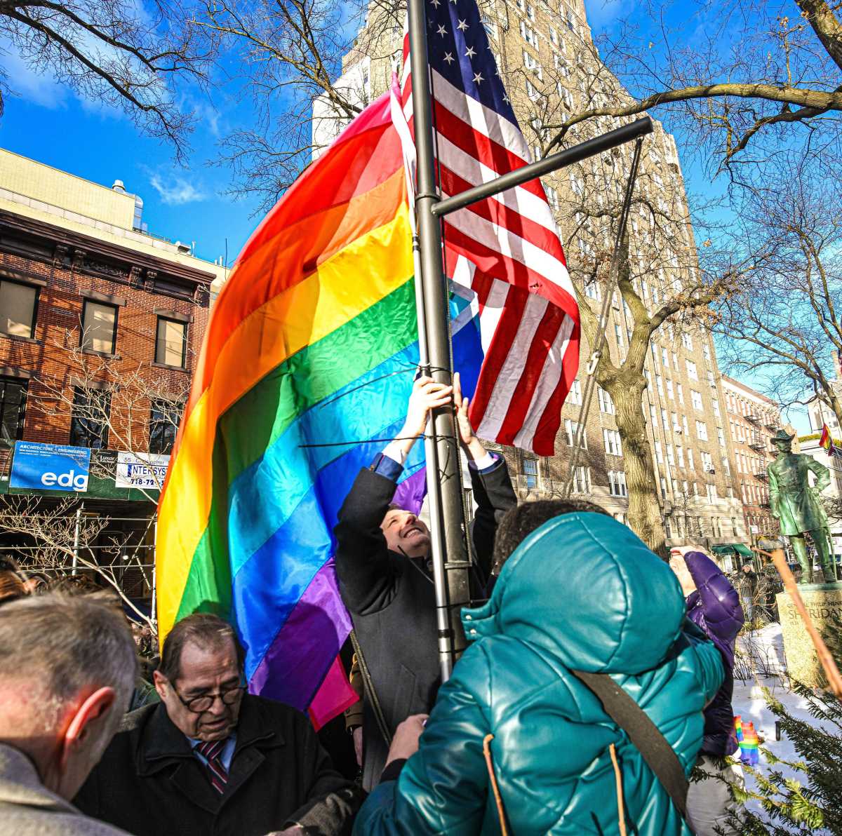 The Pride flag gets re-installed.