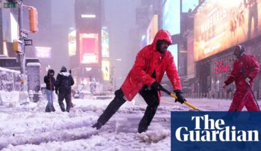 Millions face road travel bans as snow blankets New York and north-east US | US weather