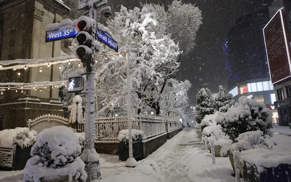 Light snow and 'freezing fog' with lows of -1C were recorded in New York