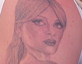 Brooklyn revealed a vast portrait of his wife on his upper arm