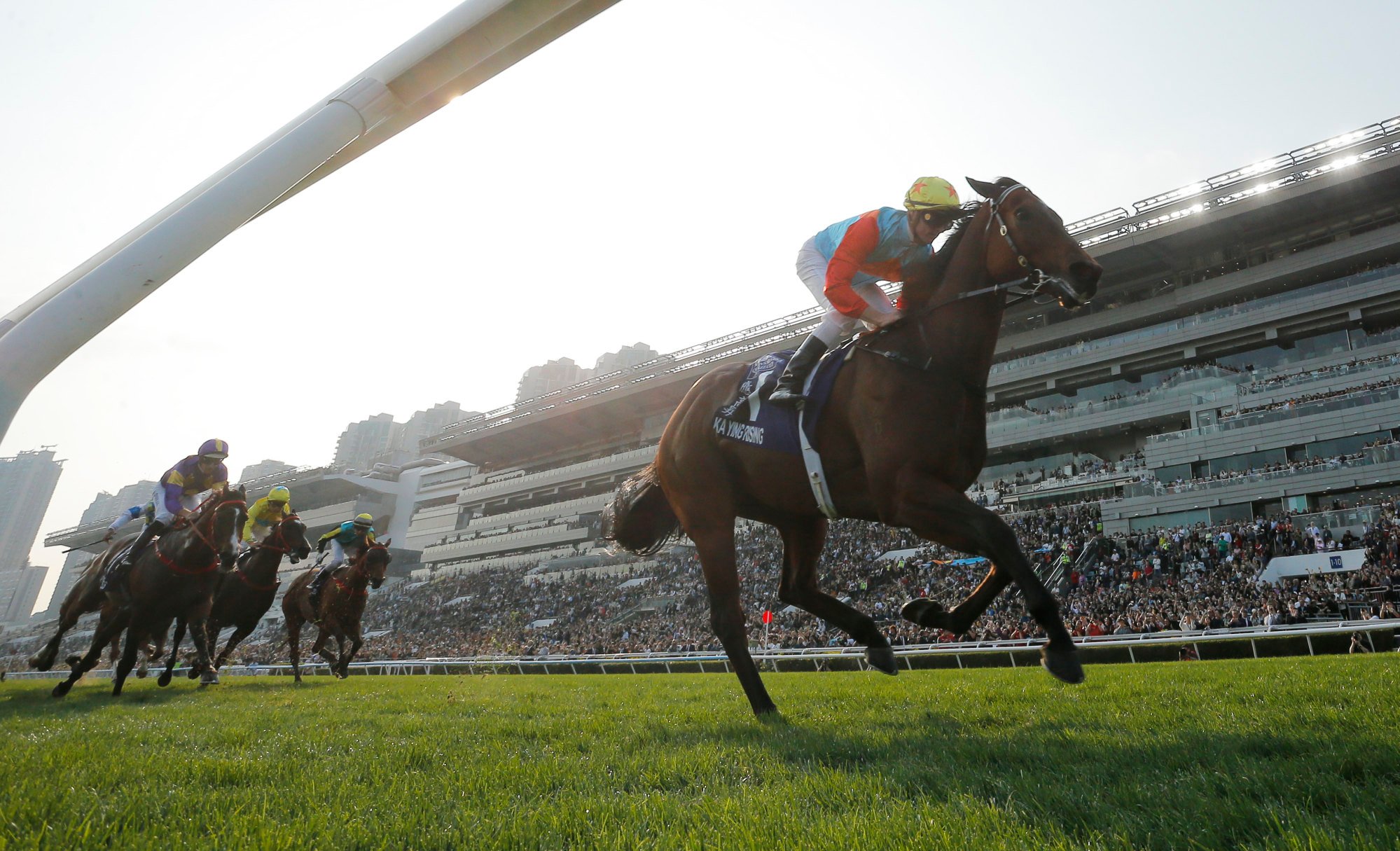 Ka Ying Rising surges clear.