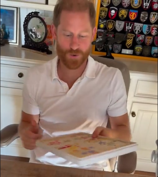 Prince Harry sits in his home office