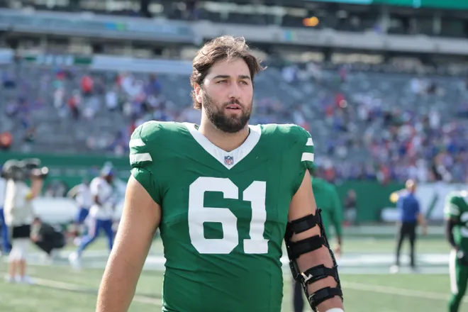 Sep 14, 2025; East Rutherford, New Jersey, USA; New York Jets offensive tackle Max Mitchell (61) after the game against the Buffalo Bills at MetLife Stadium. Mandatory Credit: Vincent Carchietta-Imagn Images