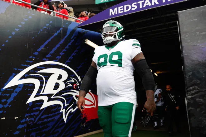 Nov 23, 2025; Baltimore, Maryland, USA; New York Jets defensive tackle Khalen Saunders (99) takes the field before the game against the Baltimore Ravens at M&T Bank Stadium. Mandatory Credit: Peter Casey-Imagn Images