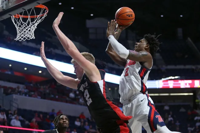 Nov 18, 2025; Oxford, Mississippi, USA; Mississippi Rebels guard AJ Storr (2) drives to the basket as Austin Peay Governors forward Collin Parker (32) defends during the second half at The Sandy and John Black Pavilion at Ole Miss.