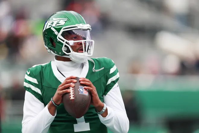Dec 28, 2025; East Rutherford, New Jersey, USA; New York Jets quarterback Hendon Hooker (1) warms up prior to the game against the New England Patriots at MetLife Stadium. Mandatory Credit: Vincent Carchietta-Imagn Images.
