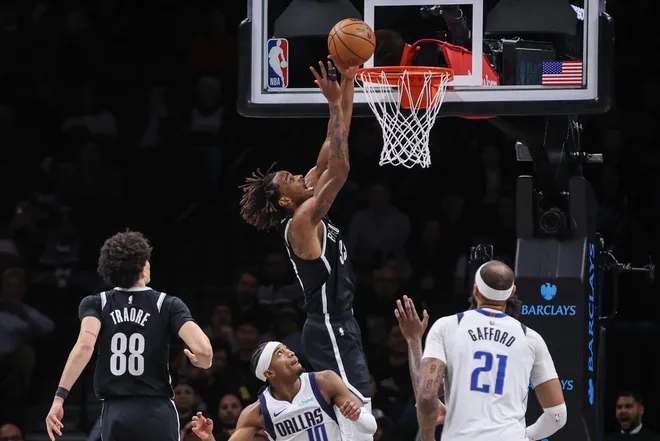 Feb 24, 2026; Brooklyn, New York, USA; Brooklyn Nets center Nic Claxton (33) goes up for a dunk attempt in the third quarter against the Dallas Mavericks at Barclays Center.