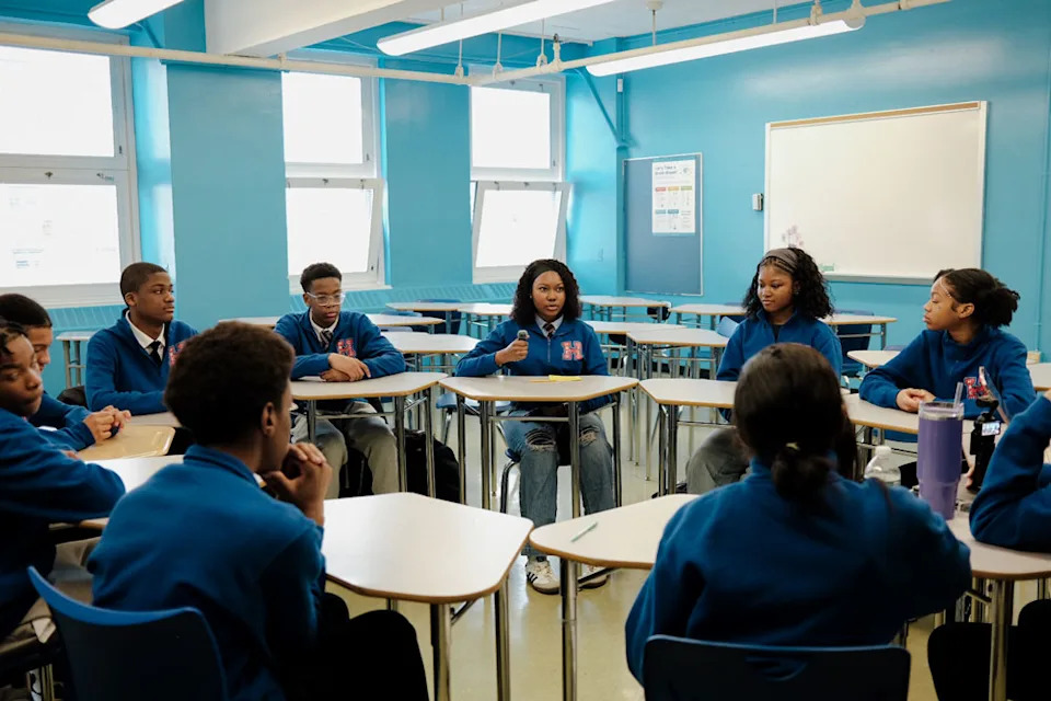 Students participate in a classroom discussion. They begin taking college classes in ninth grade and will eventually be taught by Delaware State University professors. (HBCU Early College Prep High School)