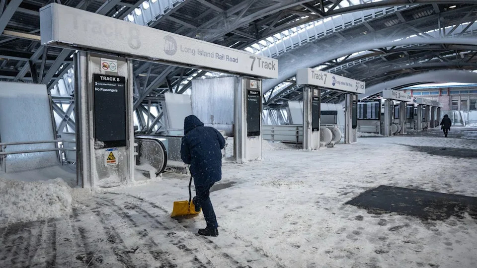 <div>A Long Island Rail Road (LIRR) worker clears snow from a platform as the system closes due to a winter storm in the Queens borough of New York, US, on Monday, Feb. 23, 2026. A powerful winter storm has buried New York City in one of its 10 snowiest days on record, and it's poised to rank among the worst blizzards in almost 50 years. Photographer: Victor J. Blue/Bloomberg via Getty Images</div>