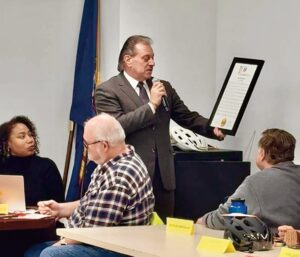 Senator Joseph P. Addabbo, Jr. presented a proclamation to Community Board 6 commemorating the 120th anniversary of Forest Hills.