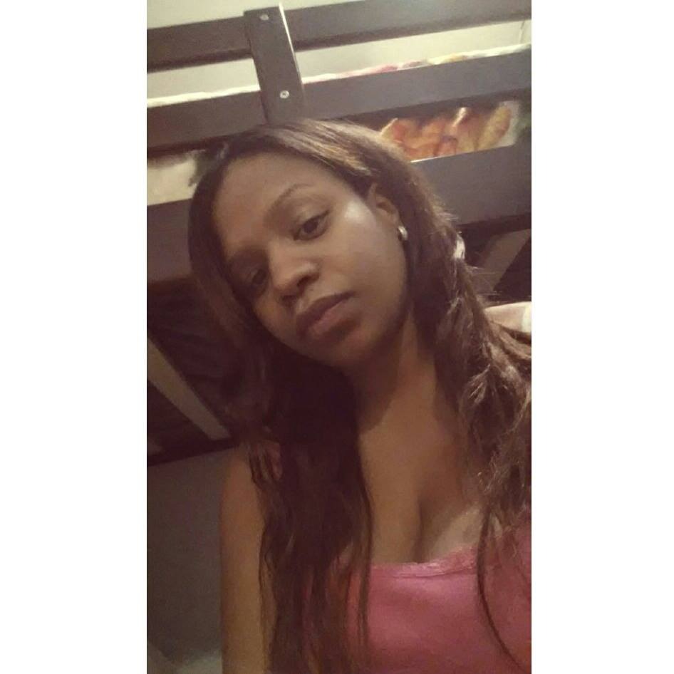 Yesenia Hall, a 42-year-old female, looking directly at the camera.