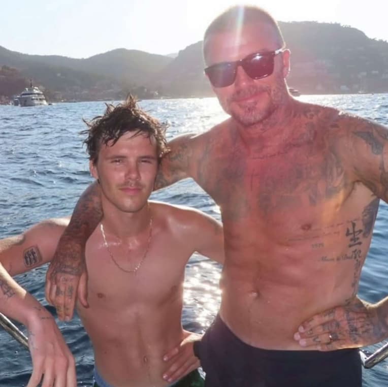 David and Cruz Beckham turn up the heat in Italy with viral speedo moment