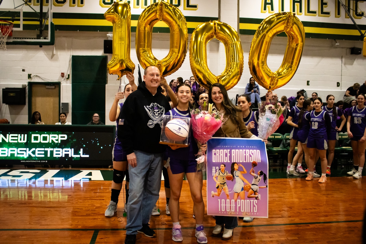 Grace Anderson nets 1000th point