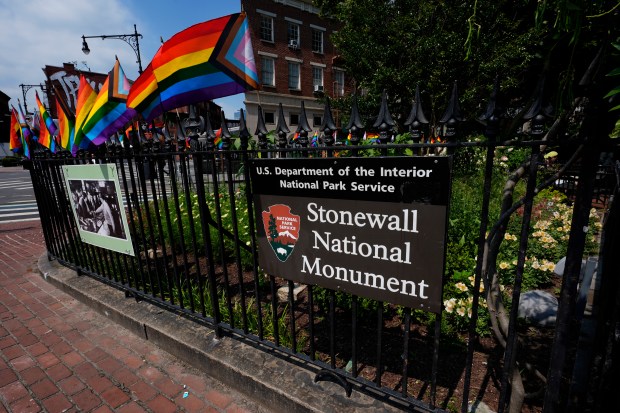 A National Park Service sign marks the Stonewall National Monument outside the Stonewall Inn in Greenwich Village.