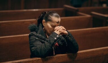 A woman prays inside St. Patrick's Cathedral on Ash Wednesday, March 5, 2025, in New York. (AP Photo/Andres Kudacki)