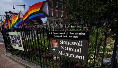 A sign marks the Stonewall National Monument outside the Stonewall Inn