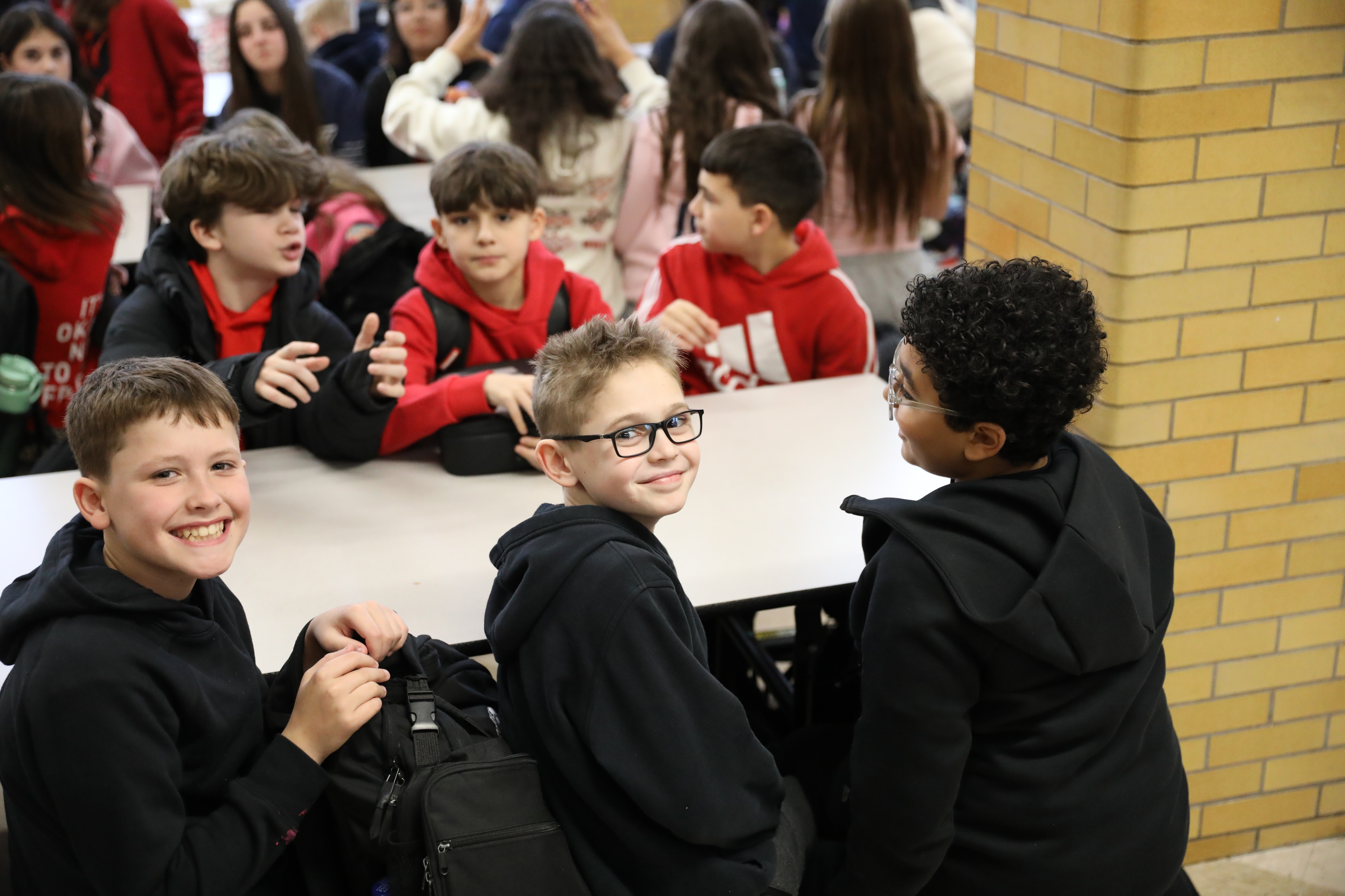 Millions of schools across the United States, including some on Staten Island, like I.S. 34 in Tottenville, took part in National No One Eats Alone Day. The lunchtime program, created by the nonprofit Beyond Differences, aims to make cafeterias more welcoming by encouraging students to connect with classmates they might not usually sit with. Today's lunch also featured dancing. (Advance/SILive.com | Jan Somma-Hammel)