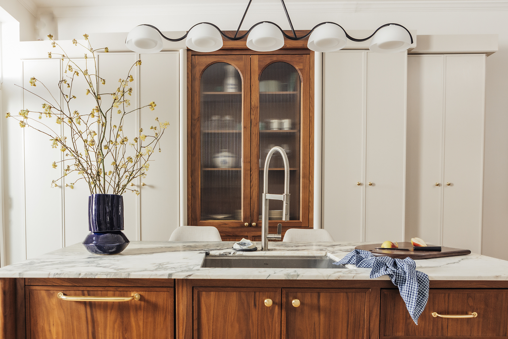 view of kitchen with white cabinets and wood cabinets