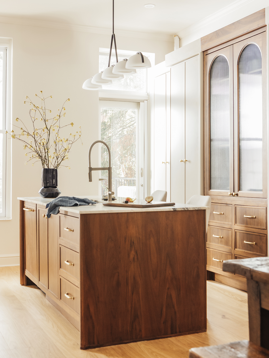 kitchen with wood cabinets and hanging pendant light