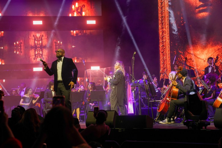 The crowd sings along with Nu Look maestro Arly Larivière as he points the microphone towards the audience at the Infosys Theatre in Madison Square Garden on Saturday, February 14, 2026, in Manhattan. Photo by Fredner Cayemitte / The Haitian Times 
