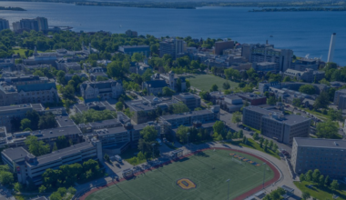 decorative image banner showing an aerial view of Queen's campus