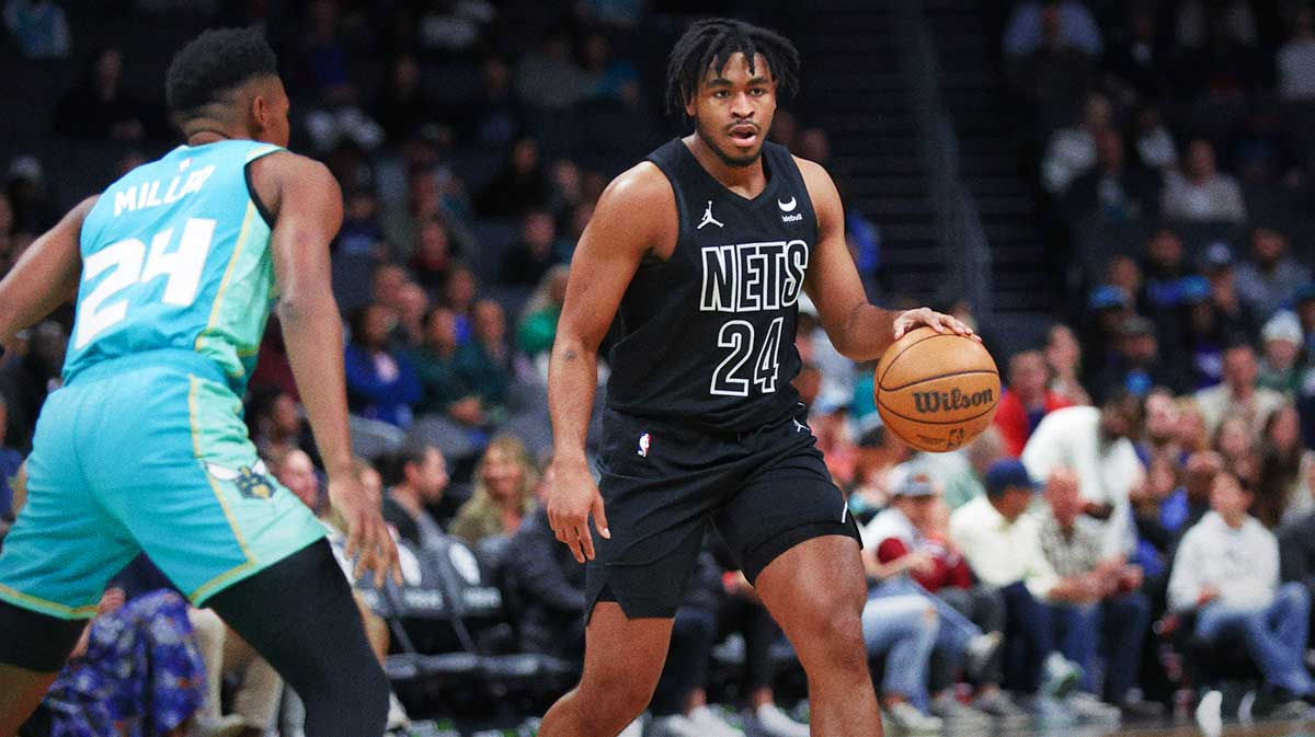 Mar 9, 2024; Charlotte, North Carolina, USA; Brooklyn Nets guard Cam Thomas (24) sets the play against the Charlotte Hornets during the first quarter at Spectrum Center. Mandatory Credit: Cory Knowlton-Imagn Images