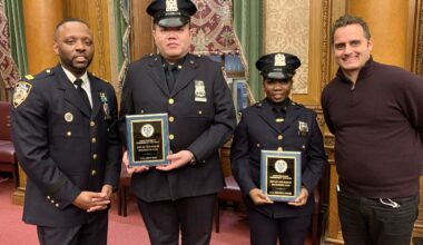 From left: 84th Precinct Commanding Officer Erek Powers, police officer Chee Tam, police officer Shenica Adams and Council President Peter Lanfranca. Tam and Adams were honored as Cops of the Month for December 2025. Photo: Mary Frost/Brooklyn Eagle