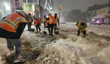Crews clearing snow and ice from roads in New York on February 23, 2026